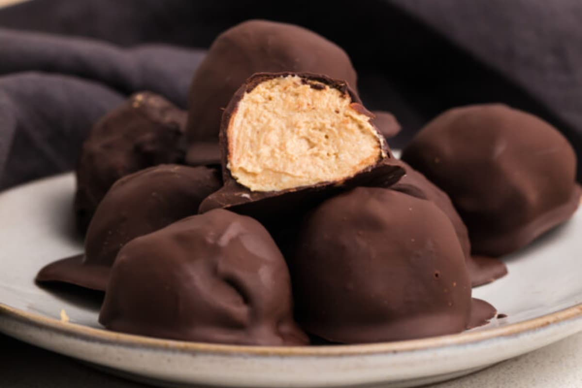 A plate of High Protein Chocolate Peanut Butter Balls.