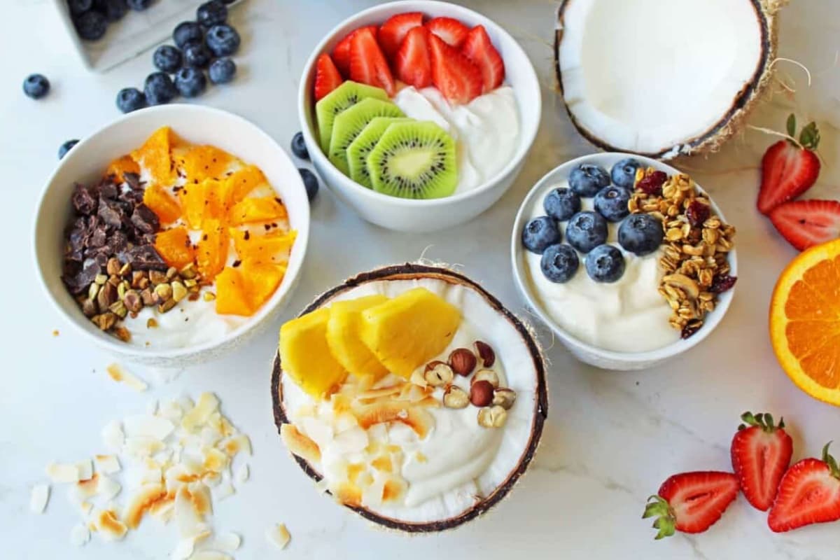 A table with Greek Yogurt Breakfast Bowls on it.