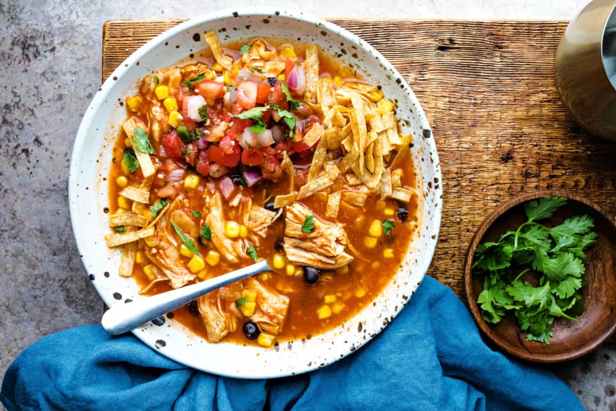 A bowl of Instant Pot Chicken Tortilla Soup.