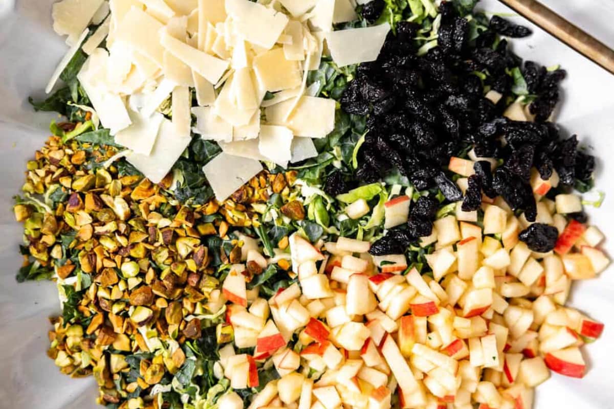 A bowl of Kale Apple Crunch Salad.