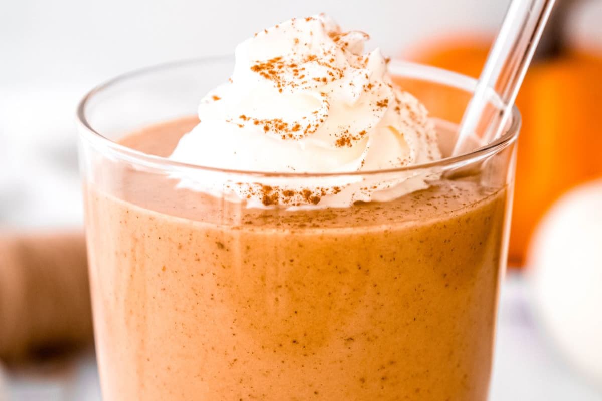 A glass of Pumpkin Pie Protein Shake.