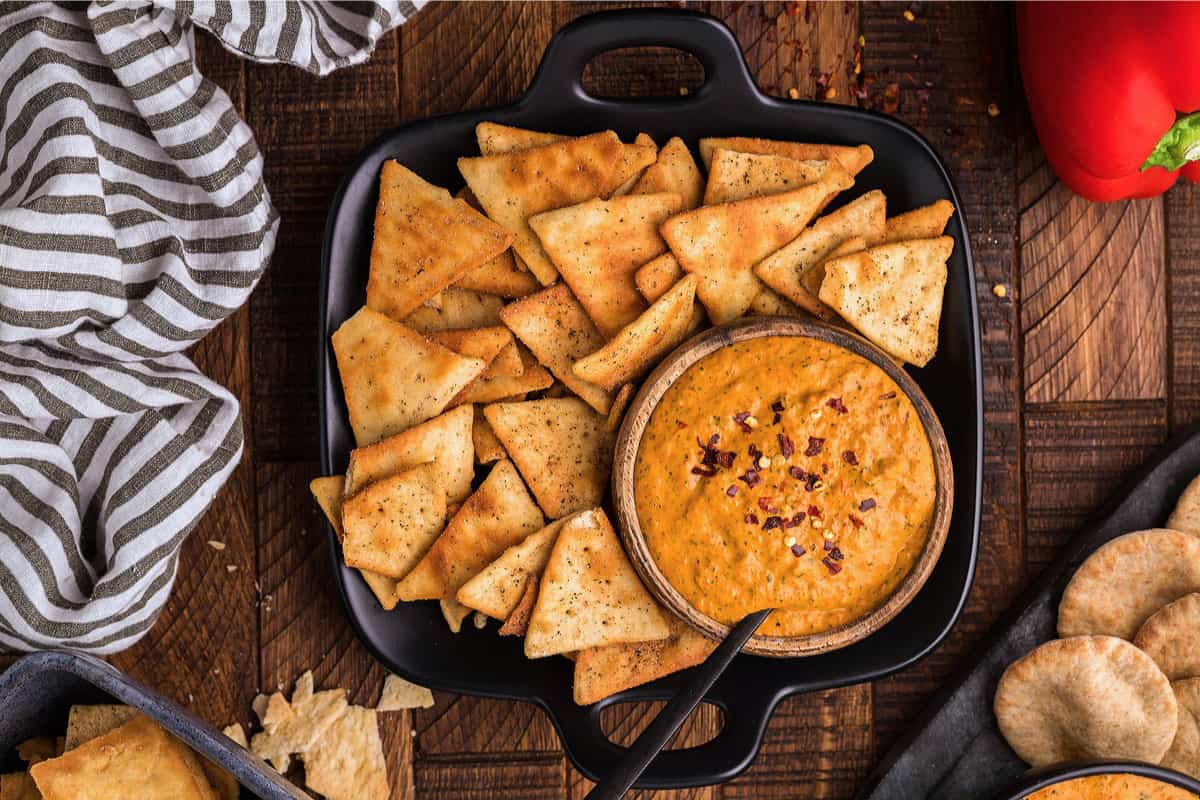 A dish of Roasted Red Pepper Garlic Dip.