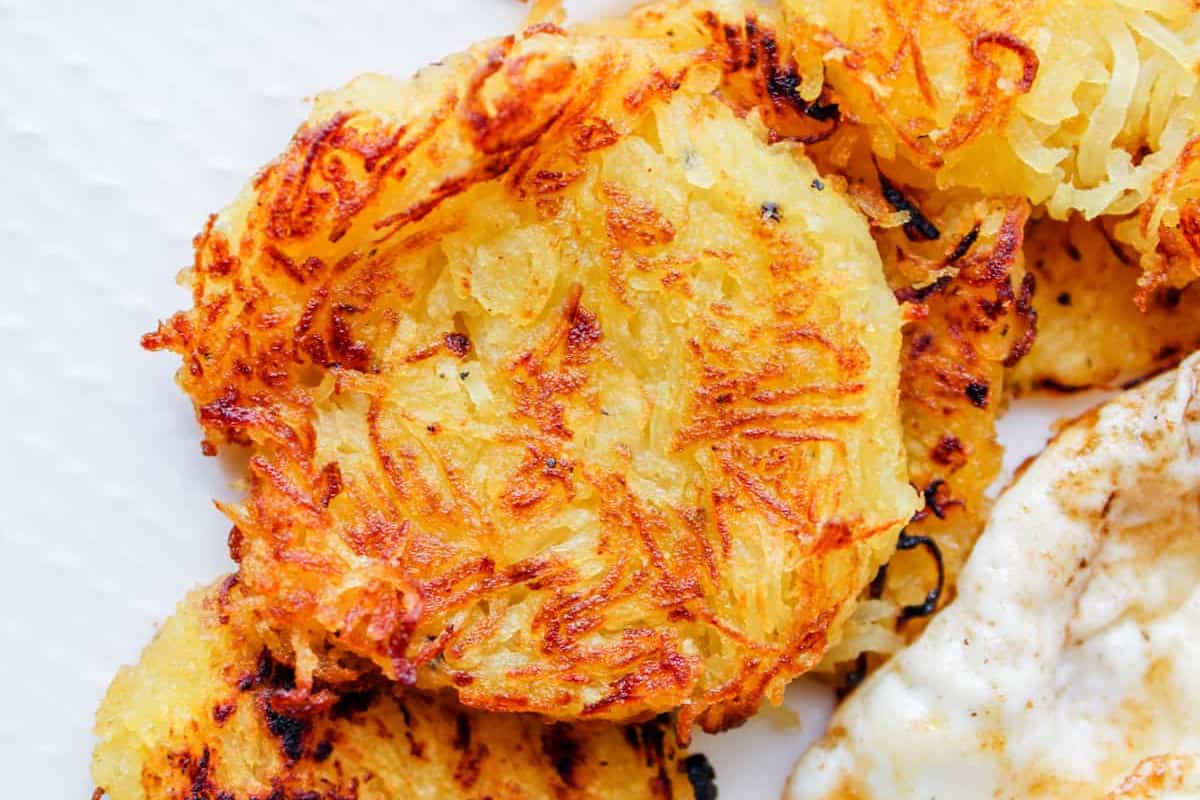 A plate of spaghetti squash hash browns.