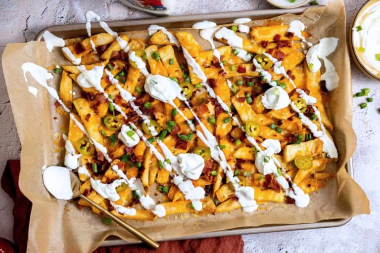 A tray of Loaded Texas Cheese Fries.