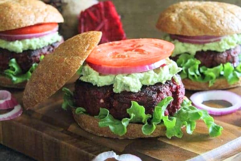 A board of Beef and Beet Burgers with Avocado Smash.