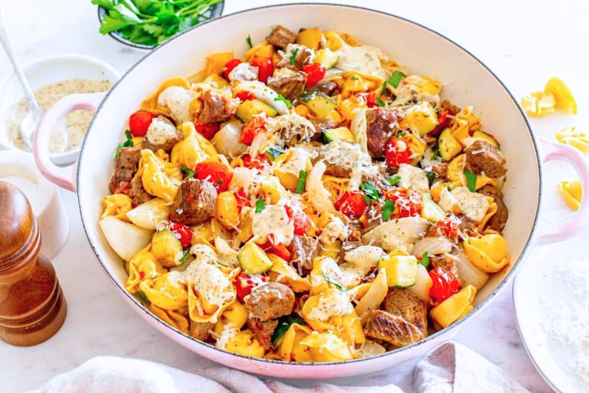 A dish of Garlic Parmesan Steak Tortellini.