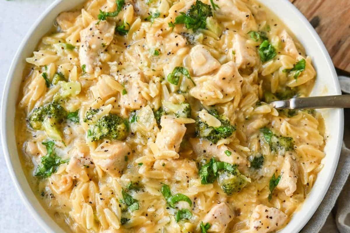 A bowl of Cheesy Chicken Broccoli Orzo.