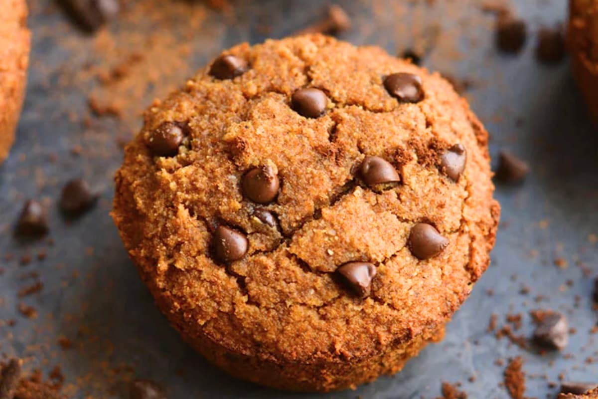 A plate of Almond Flour Pumpkin Chocolate Chip Muffins.