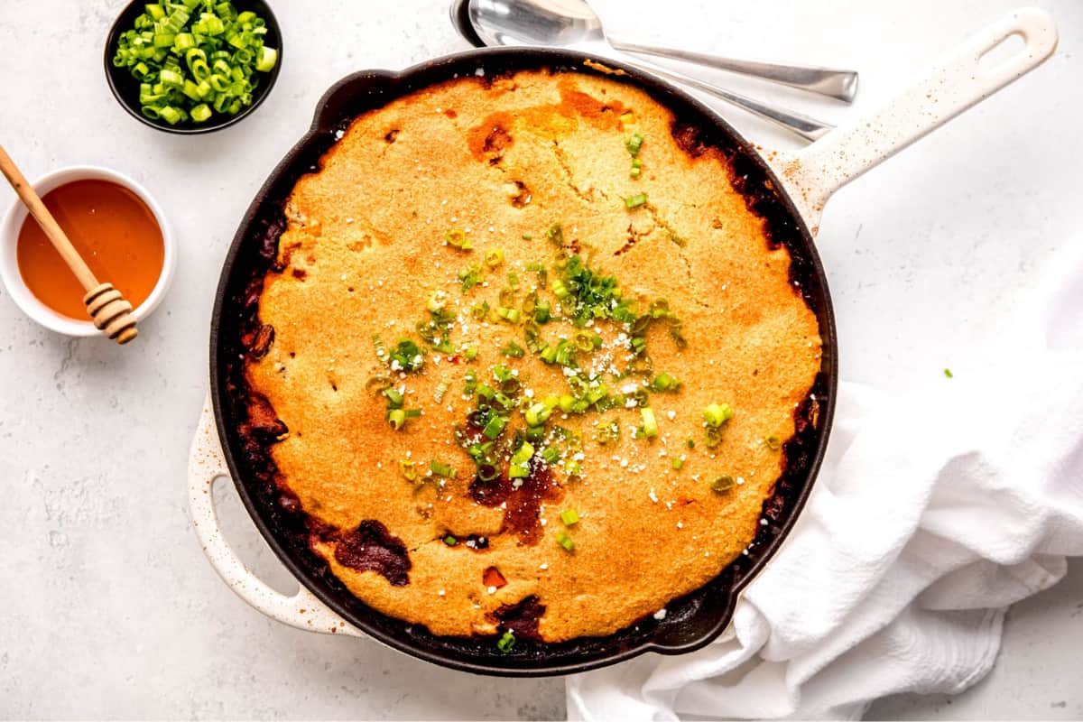 A dish of Healthier Chili Cornbread Casserole.