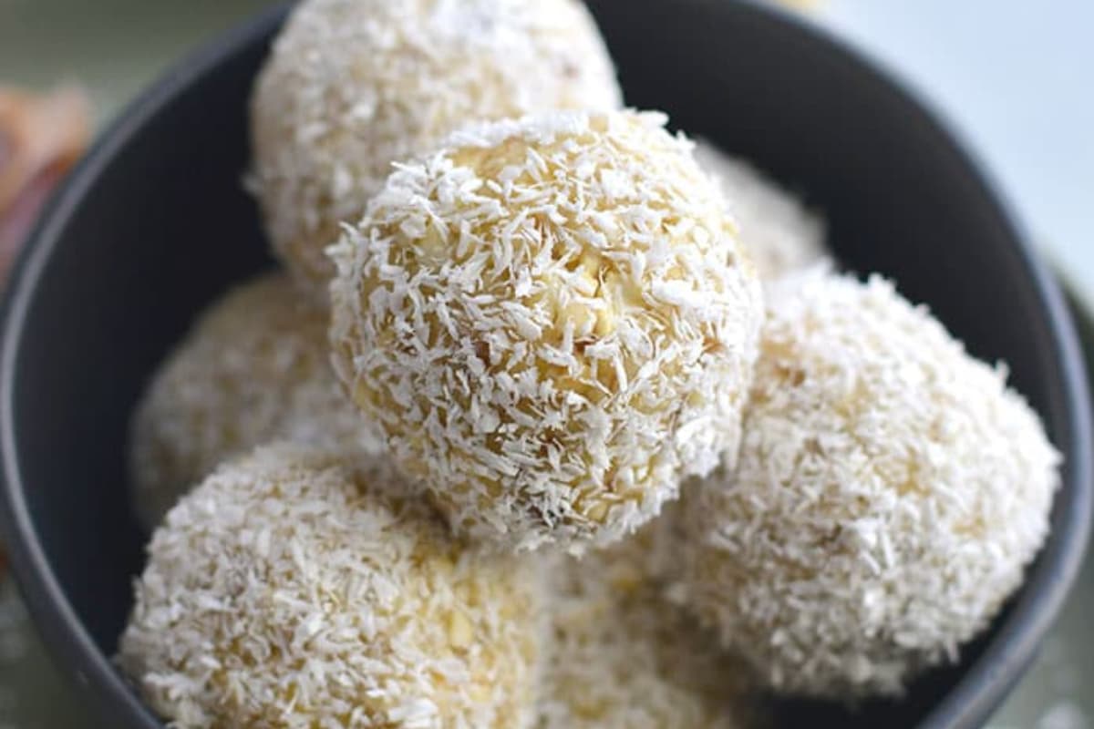 A bowl of Coconut Cashew Pineapple Bites.