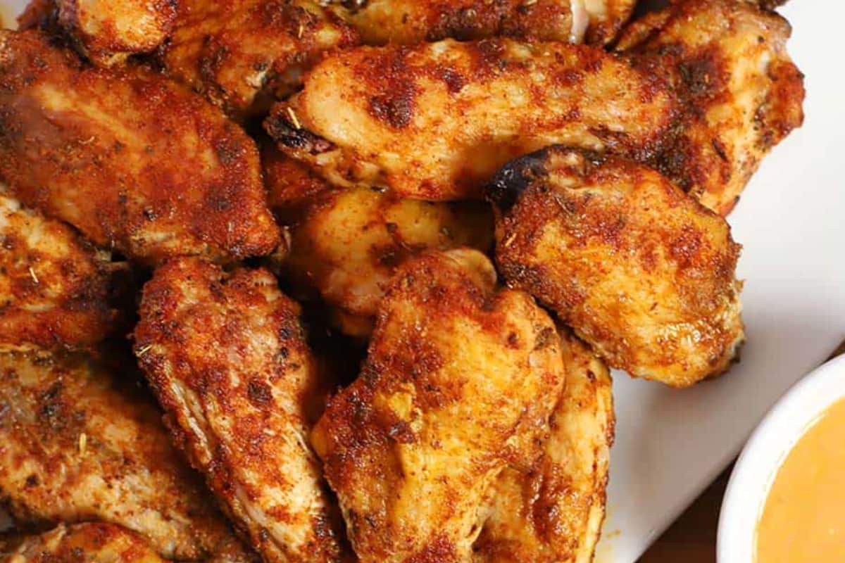 A plate of Dry Rubbed Chicken Wings.