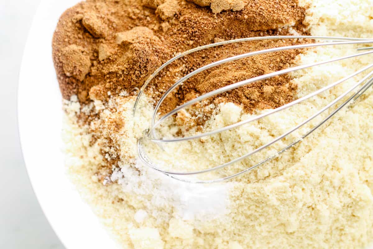 Ingredients being whisked in a bowl.