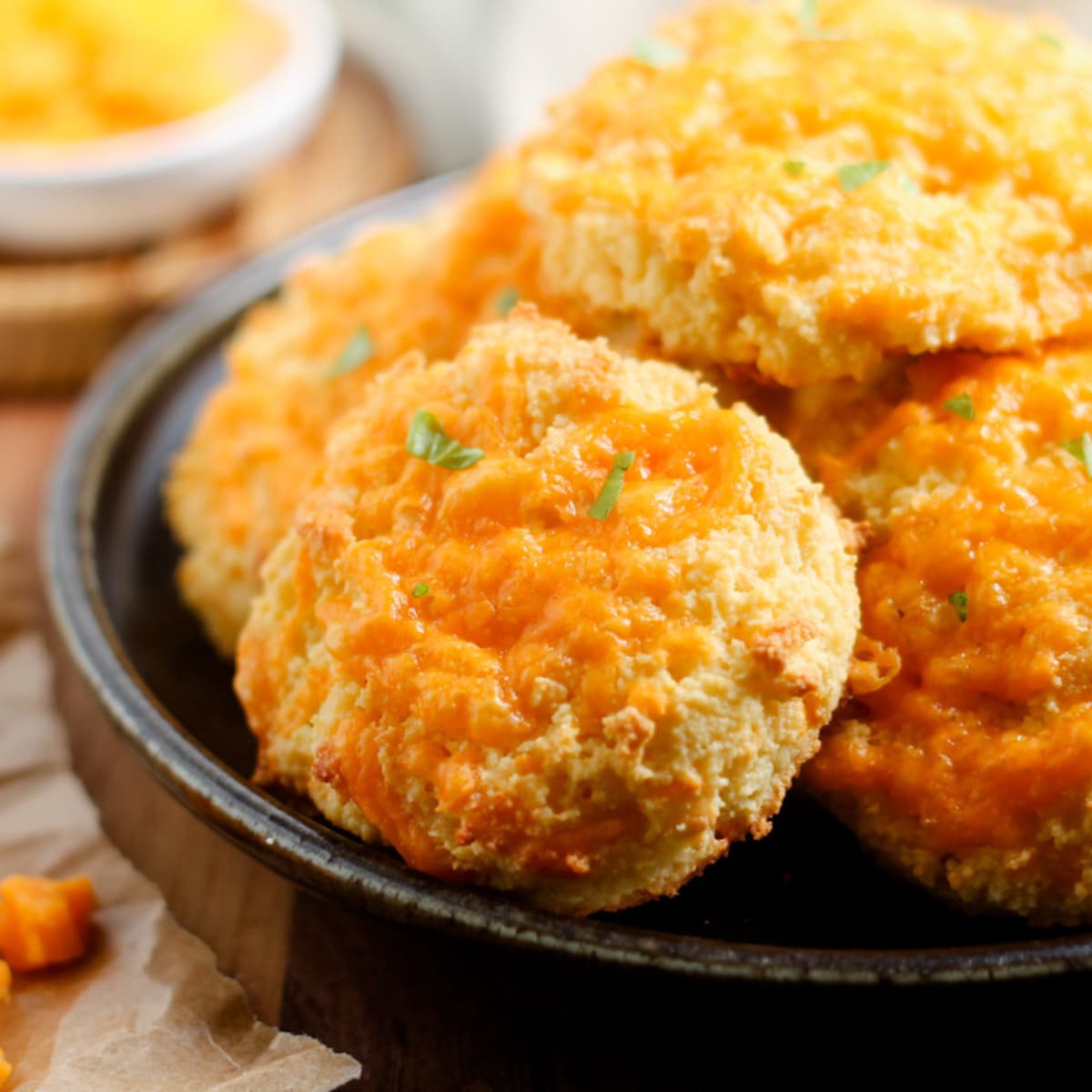 A plate of gluten-free cheddar biscuits.