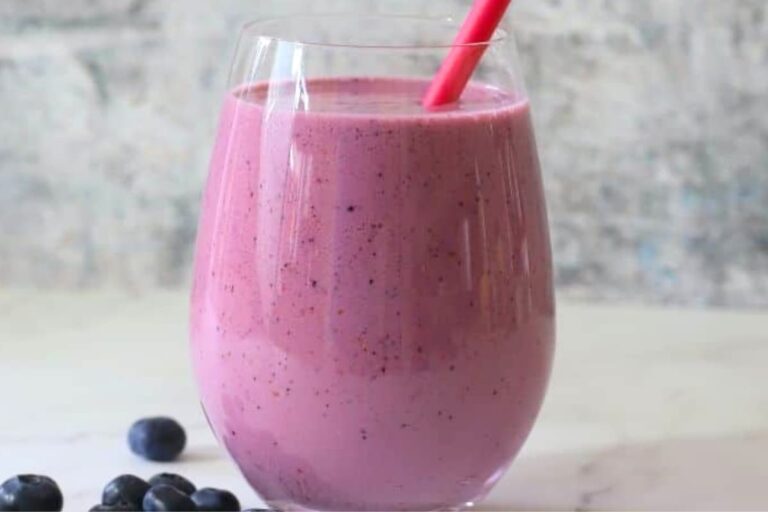 A glass of Low Carb Berry Protein Smoothie.