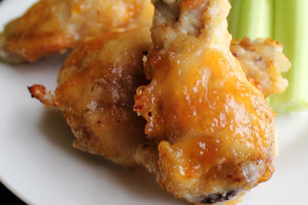 A plate of Baked Peach Habanero Chicken Wings.