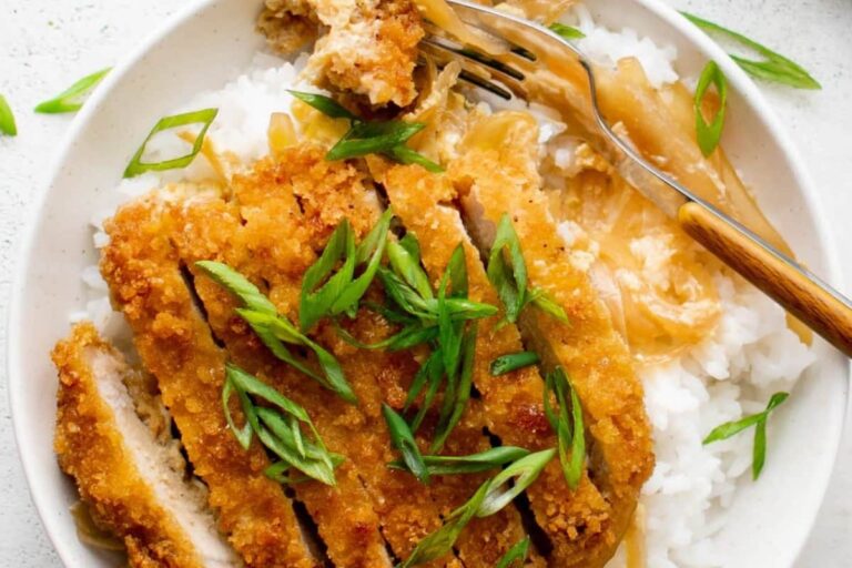 A plate of Katsudon Japanese Pork Cutlet Rice Bowl.