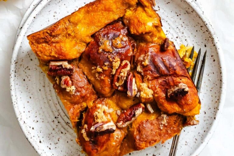 A plate of Pumpkin Pecan Brioche Pudding.