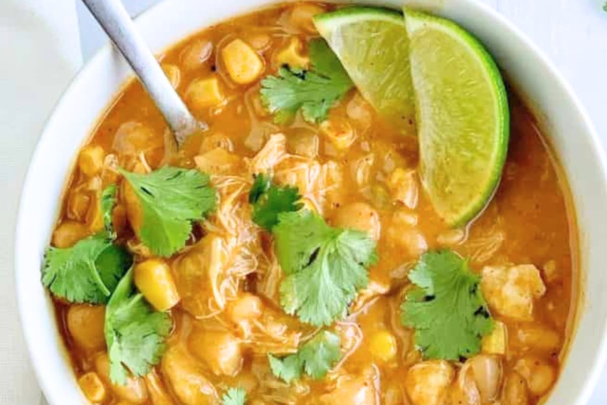 A bowl of Coconut Lime White Bean Chicken Chili.