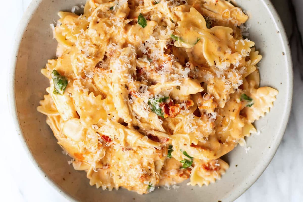 A dish of Creamy Tomato Garlic Chicken Pasta.