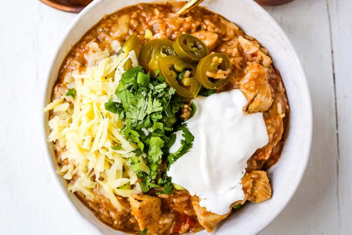 A bowl of Cheesy Mexican Chicken and Rice.
