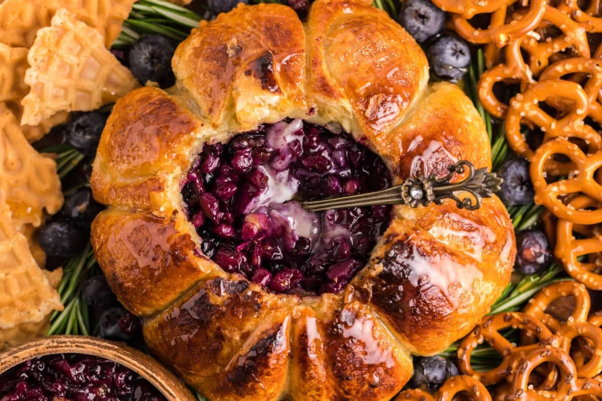 A dish of Air Fryer Baked Brie with Blueberries.
