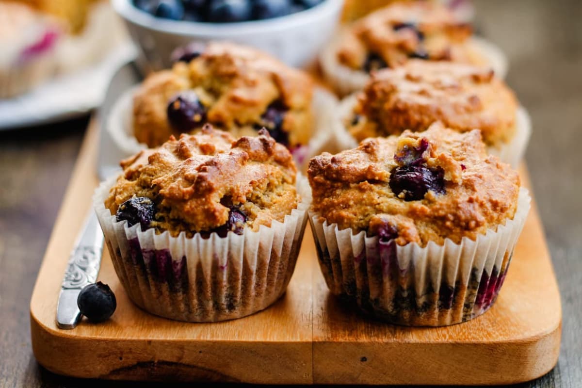 A plate of Almond Flour Blueberry Muffins.