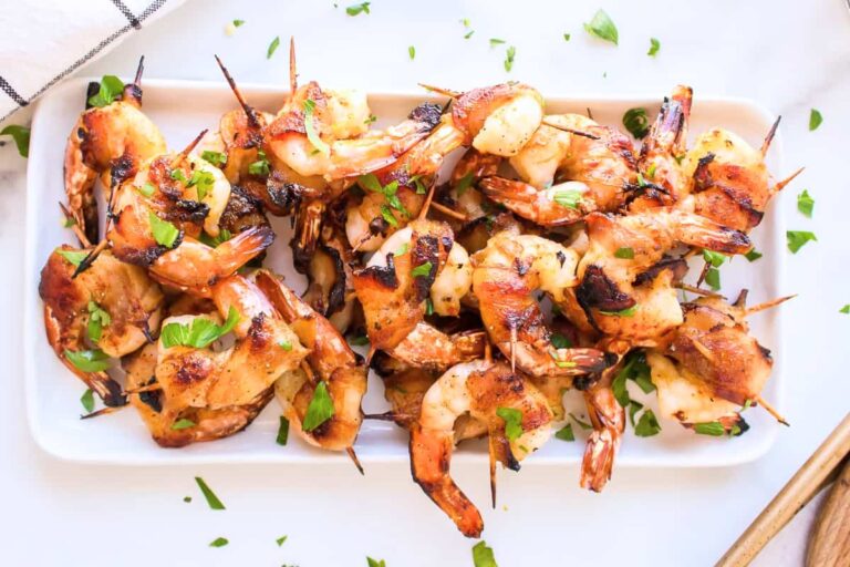 A plate of Bacon Wrapped Shrimp.