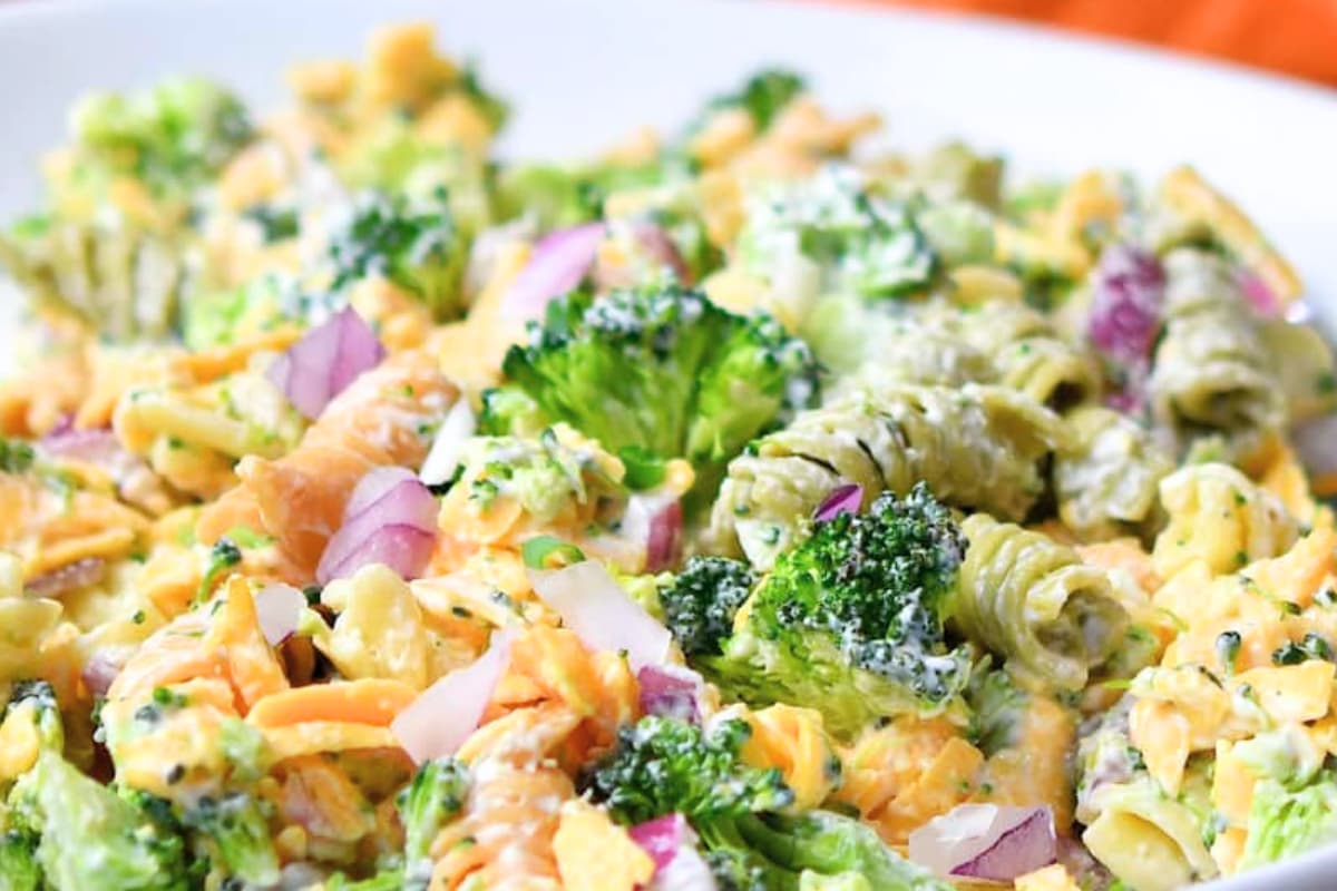 A bowl of Copycat Broccoli Cheddar Pasta Salad.
