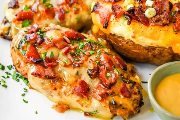 A plate of Cheesy Bacon Smothered Chicken.