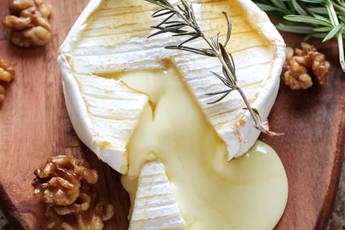 A plate of Baked Brie with Honey.