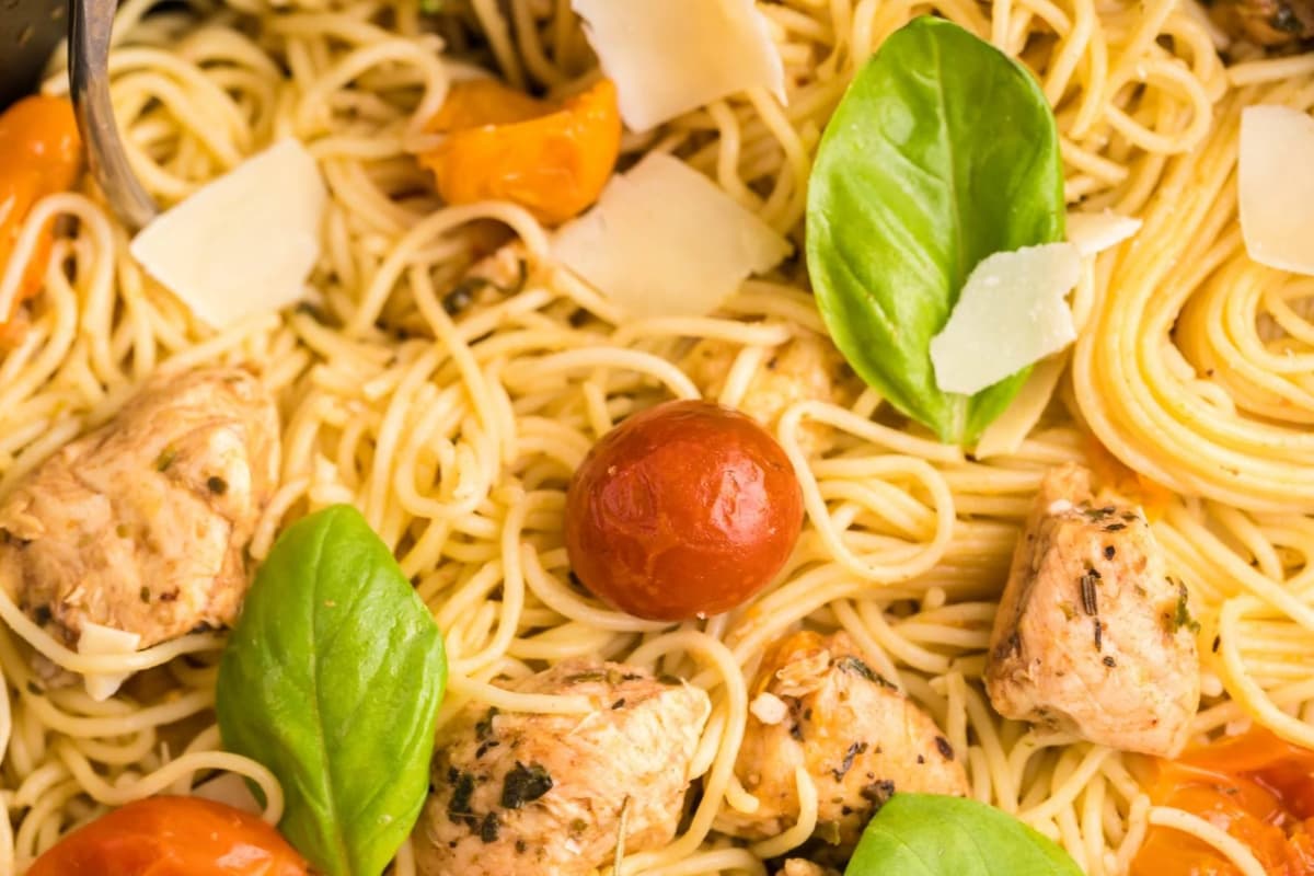 A dish of Sheet Pan Chicken Caprese Pasta.