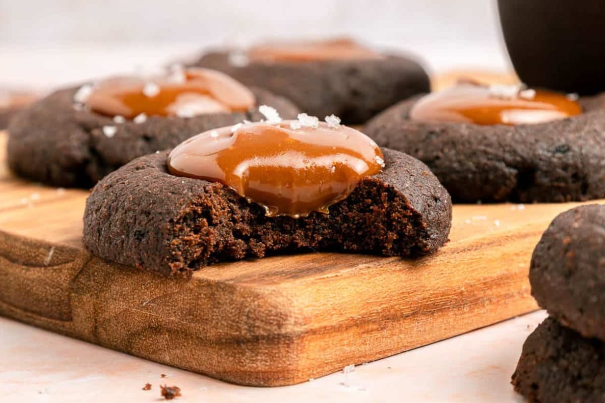 A plate of Chocolate Thumbprint Cookies with Dulce de Leche.