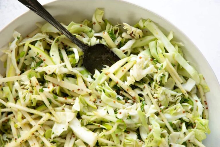 A bowl of Crunchy Apple Coleslaw.