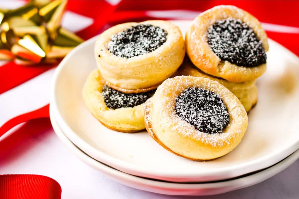 A plate of Czech Kolacky with Poppy Seed Filling.