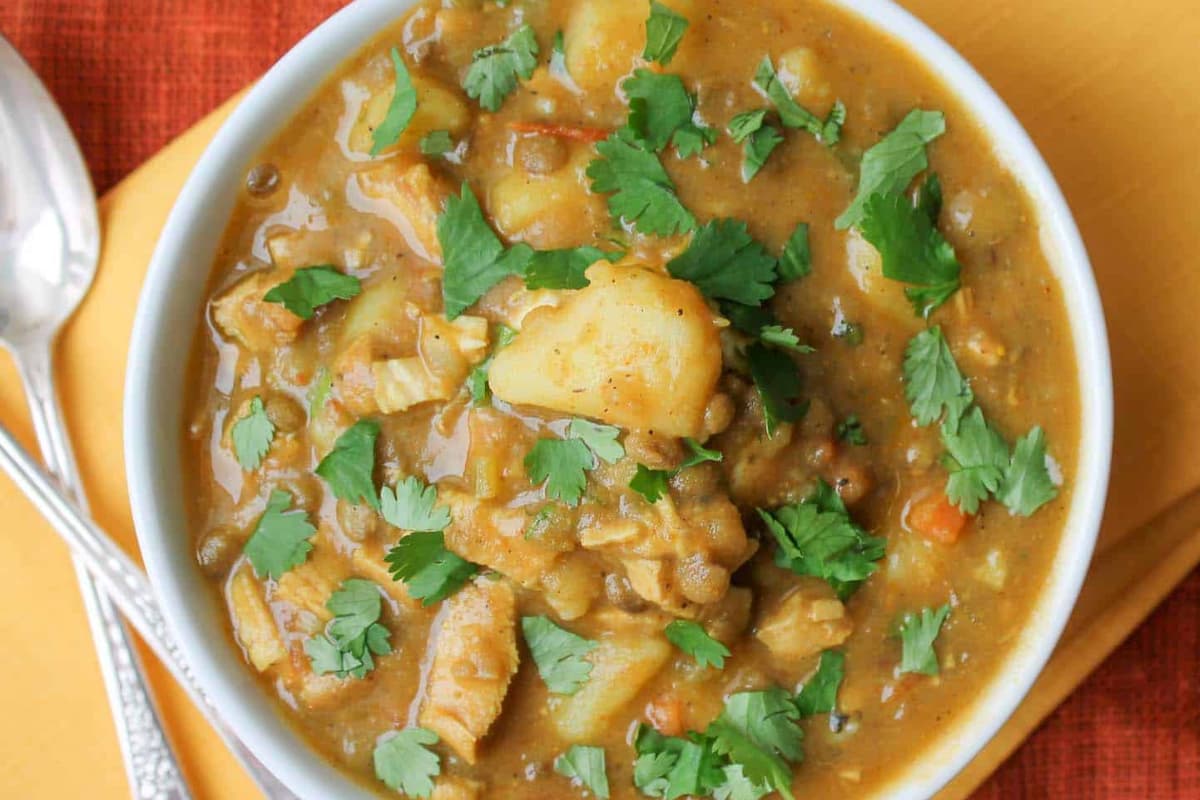 A bowl of Curried Lentil and Potato Stew.