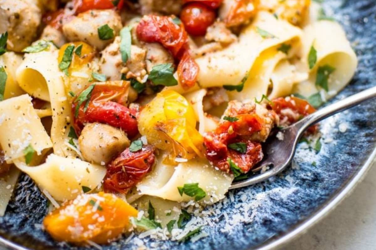 A dish of Chicken Sausage Pasta with Roasted Tomatoes.