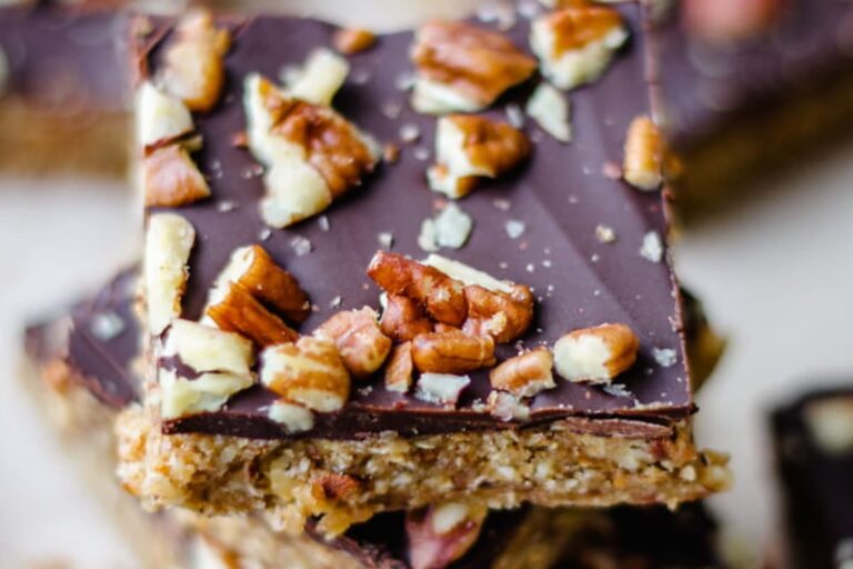 A plate of No Bake Chocolate Pecan Bars.
