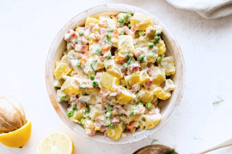 A bowl of Russian Potato Salad.