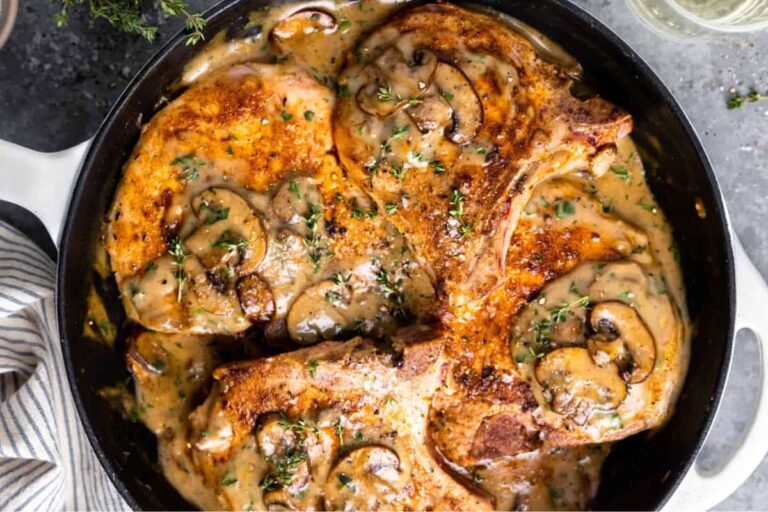 A dish of Pork Chops with Cream of Mushroom Soup.