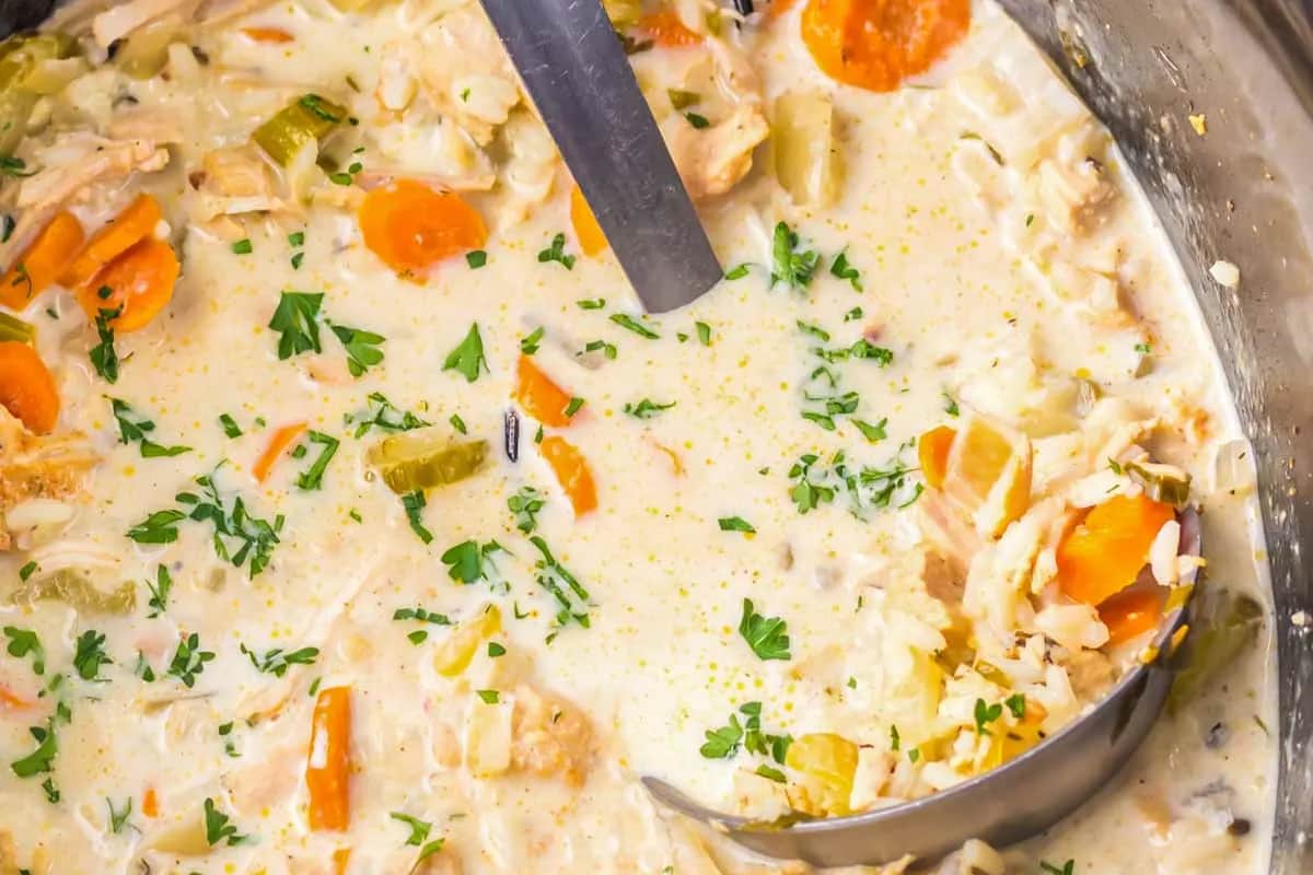 A dish of Slow Cooker Leftover Chicken or Turkey Rice Soup.