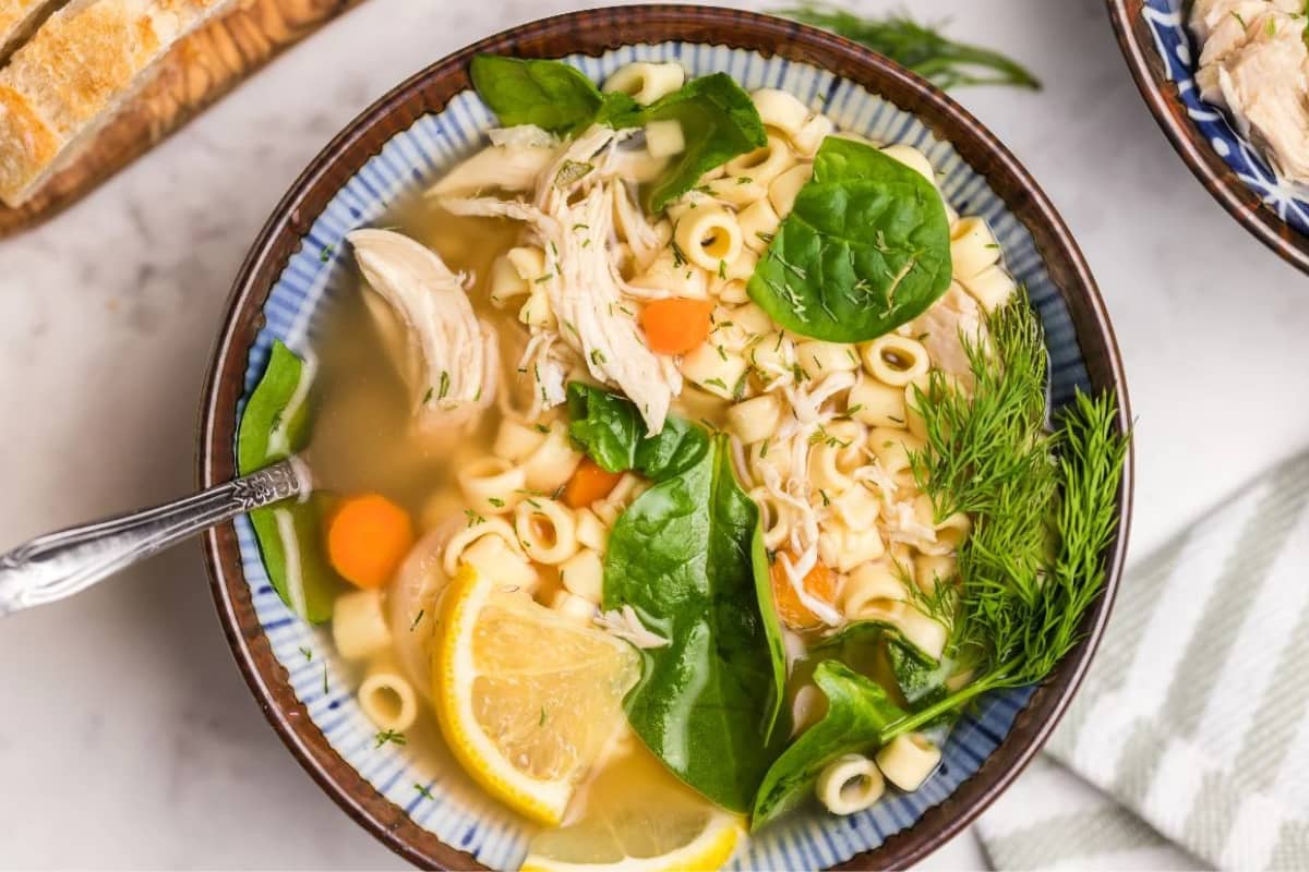 A bowl of Slow Cooker Greek Lemon Chicken Soup.