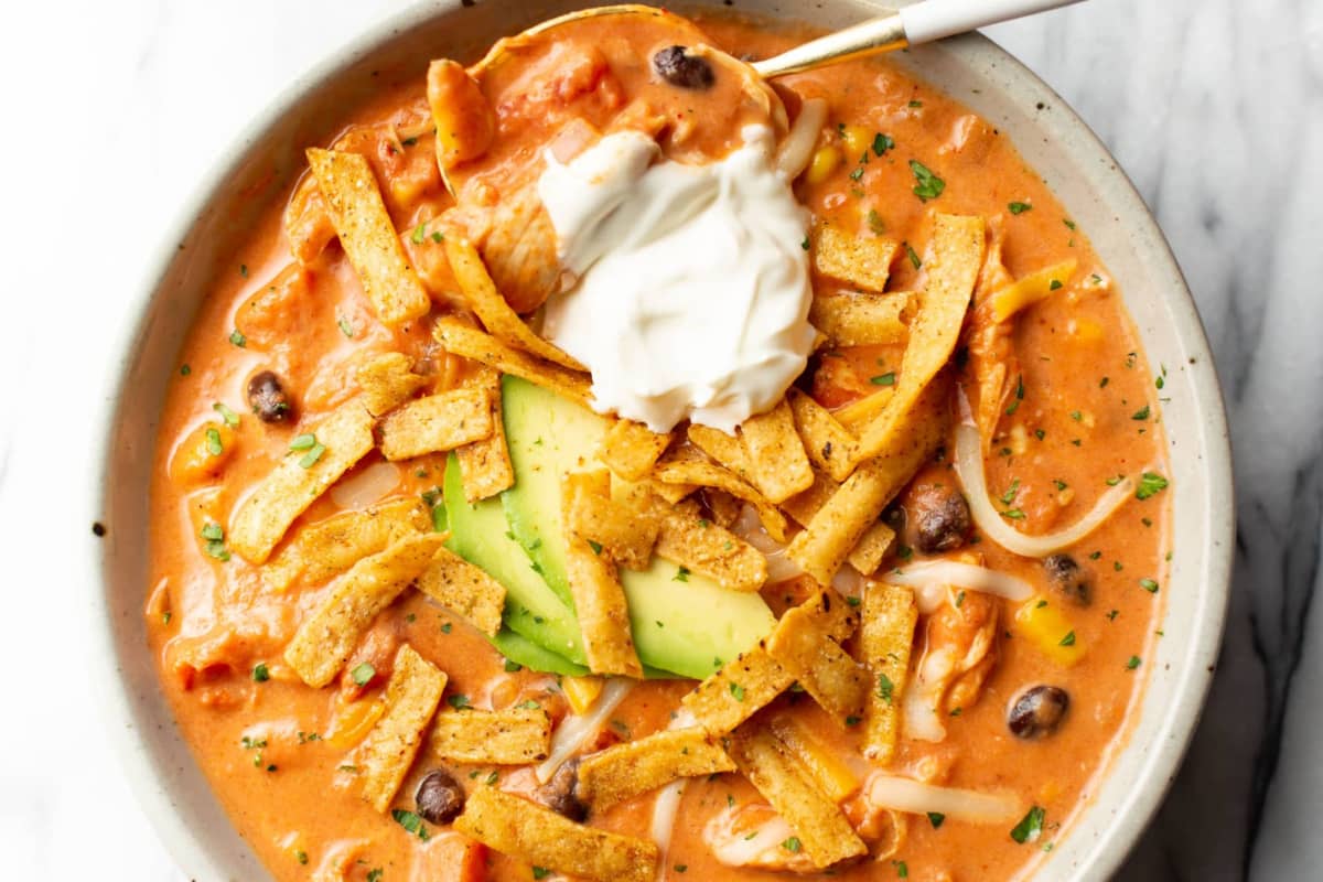 A bowl of Creamy Chicken Tortilla Soup.