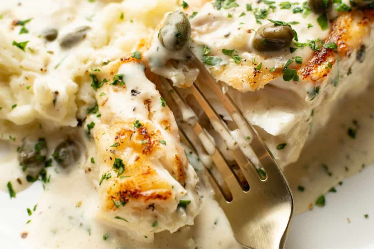 A plate of Creamy White Wine Halibut.