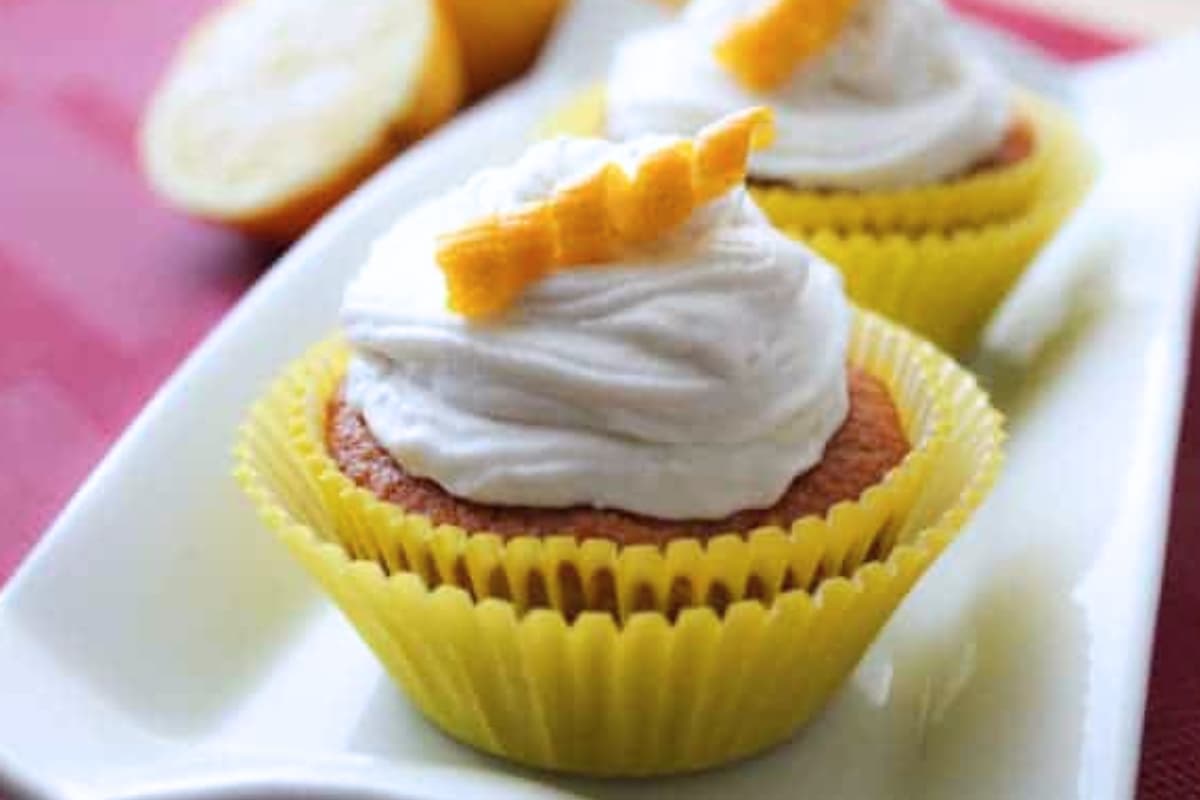 A plate of Lemon and Greek Yogurt Cupcakes.
