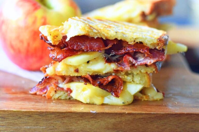 A plate of Gouda Honeycrisp Apple Bacon Grilled Cheese.