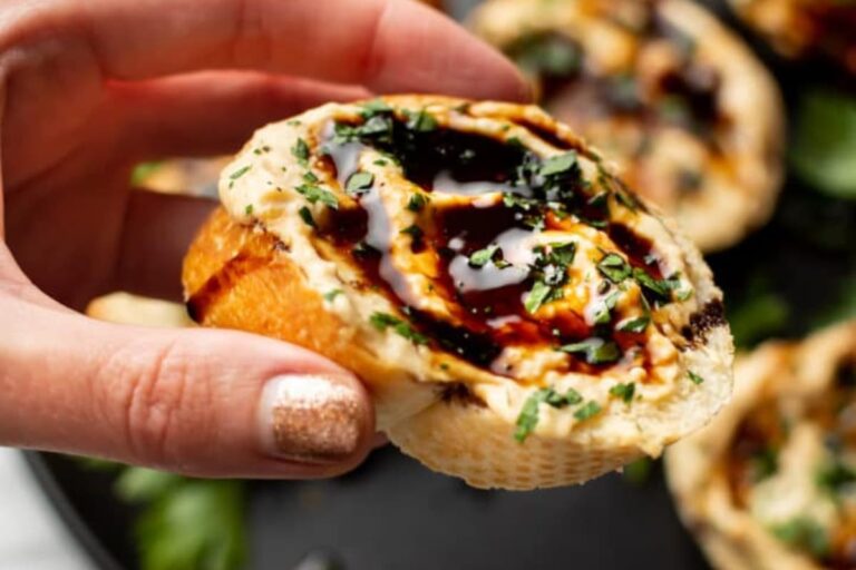 A plate of Hummus Crostini Appetizer.