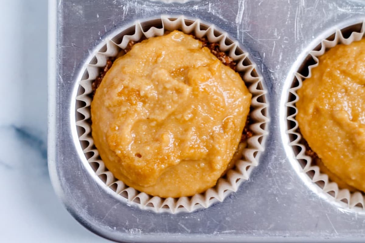Batter in a muffin pan.