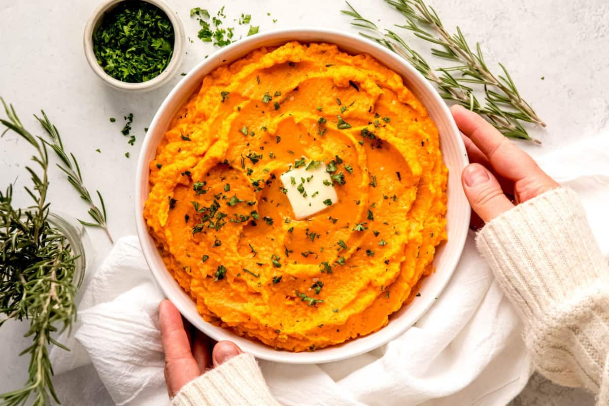 A bowl of Herby Mashed Sweet Potatoes.