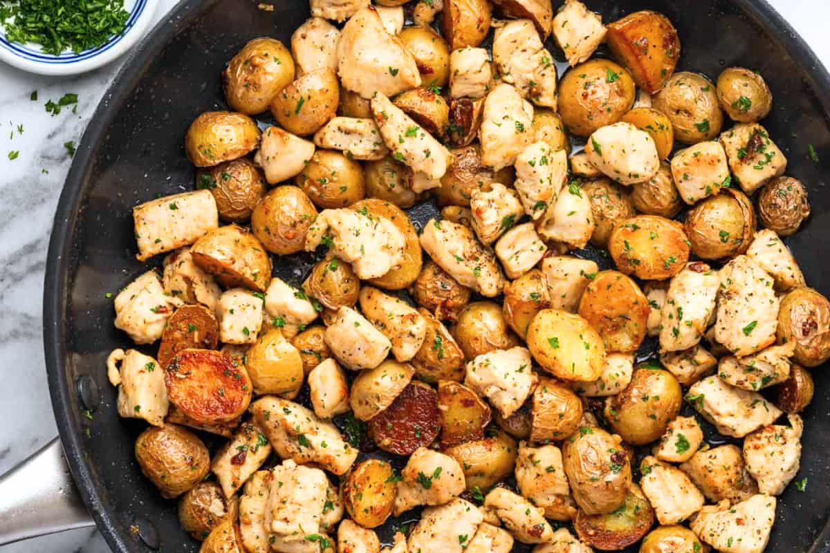 A dish of Garlic Butter Chicken and Potato Skillet.