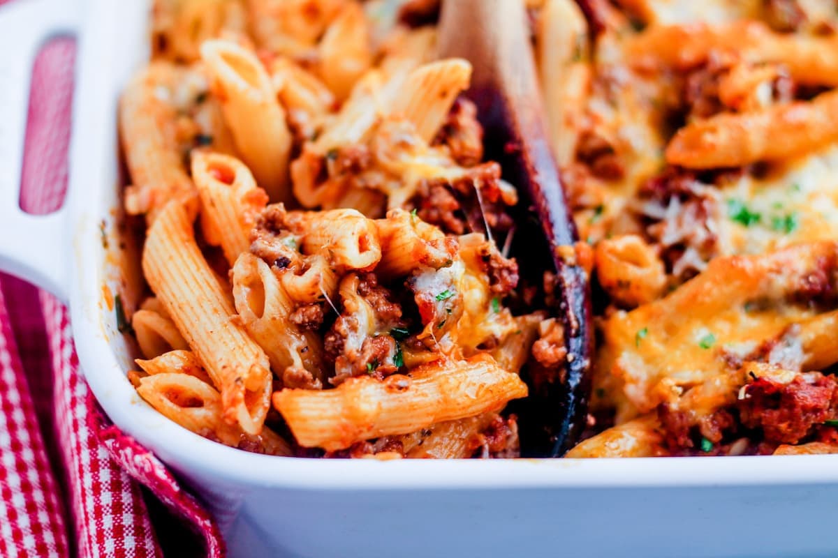 A dish of ground beef penne pasta bake.